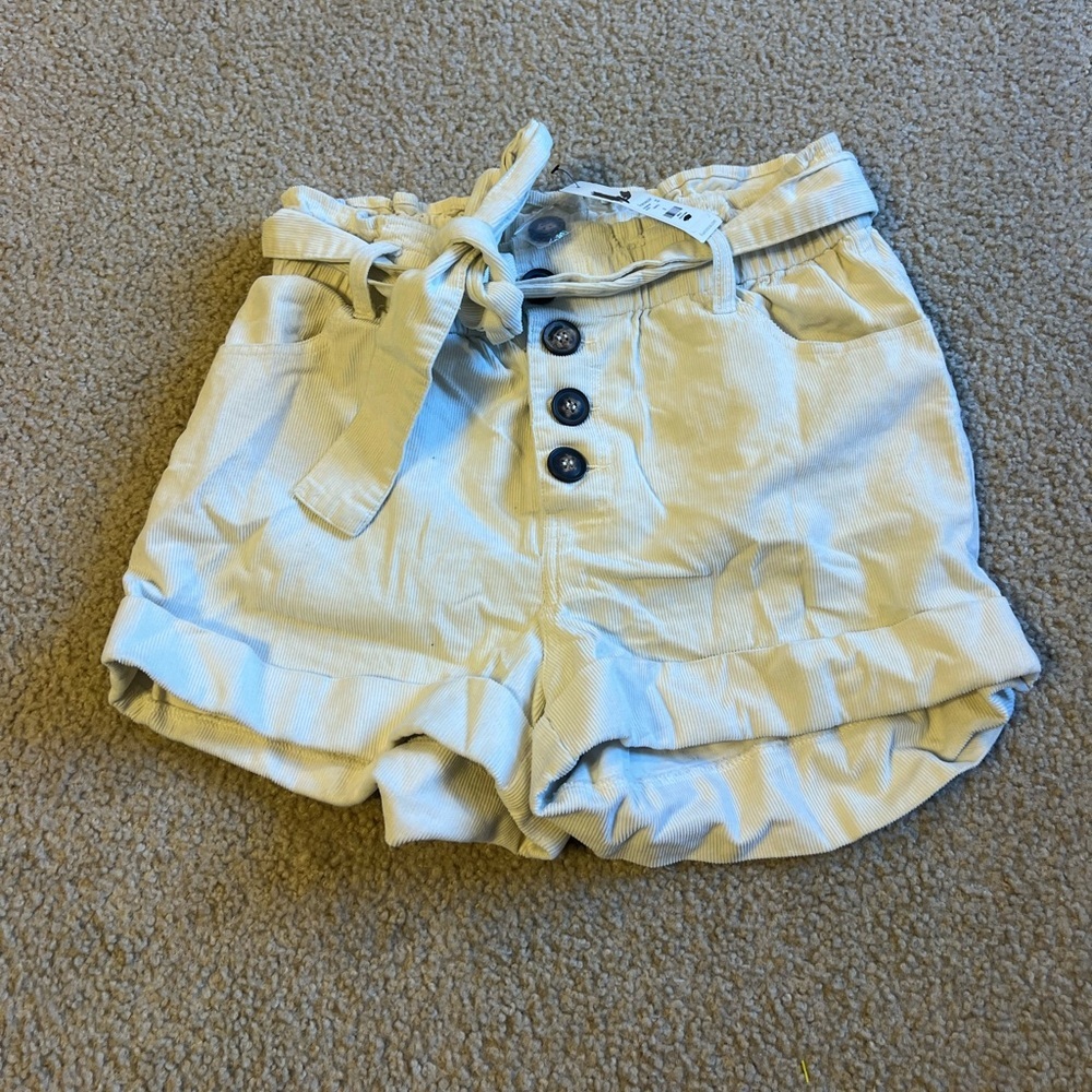 Francesca's Collections Cream Buttoned High Waist Shorts